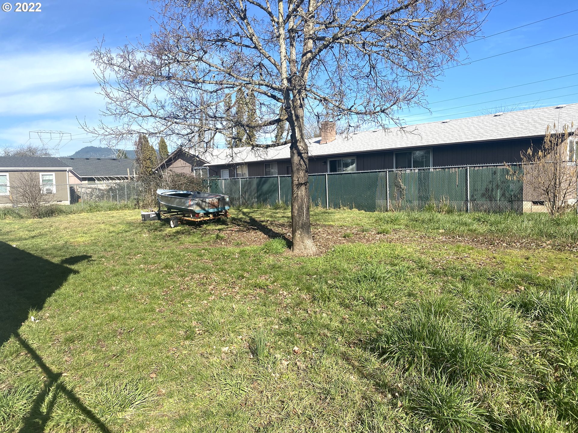 5560 A Street Springfield, OR 97478 - Photo 17 of 21 a backyard of a house with table and chairs