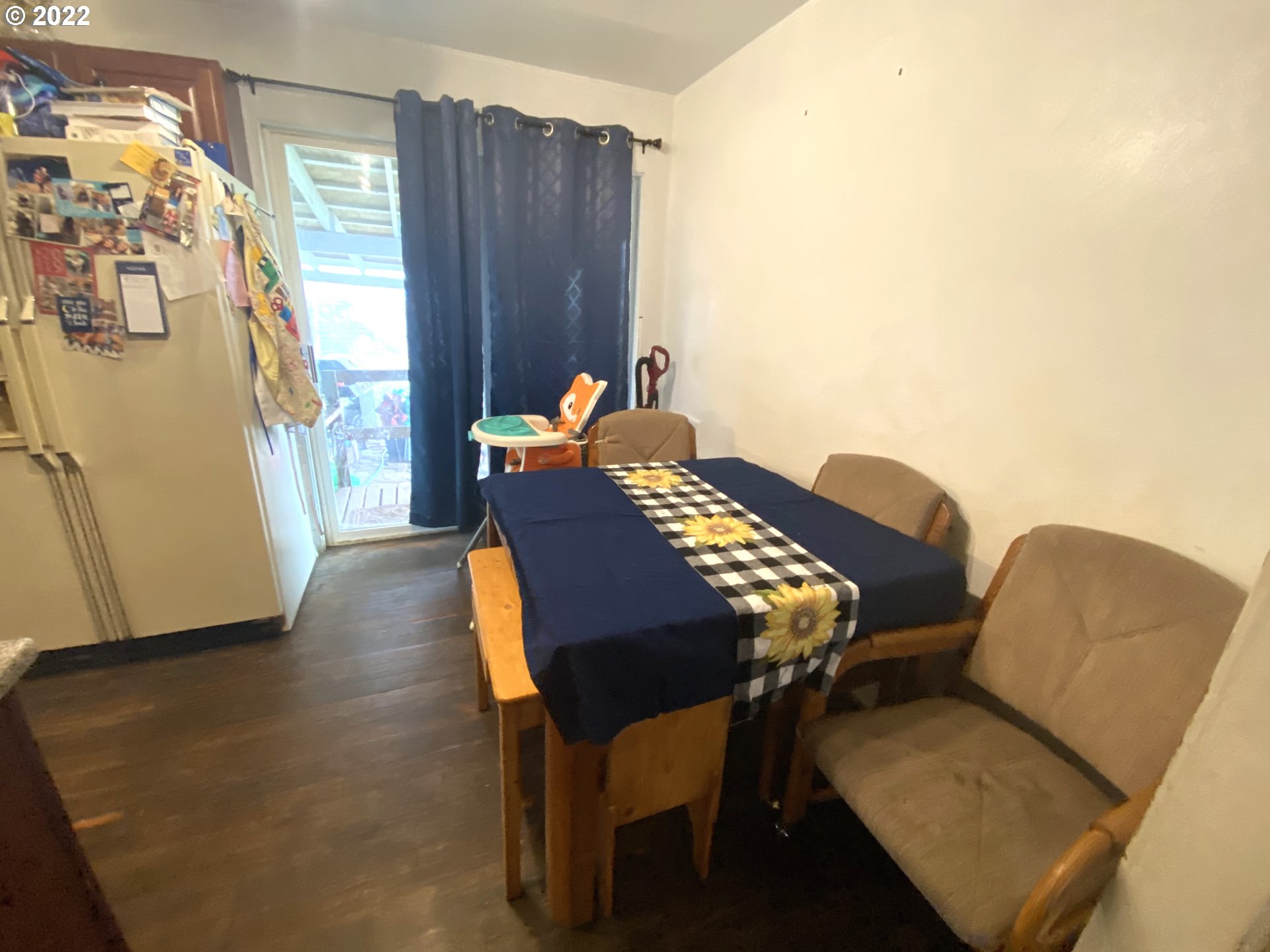 5560 A Street Springfield, OR 97478 - Photo 7 of 21 a view of a dining room with furniture and wooden floor