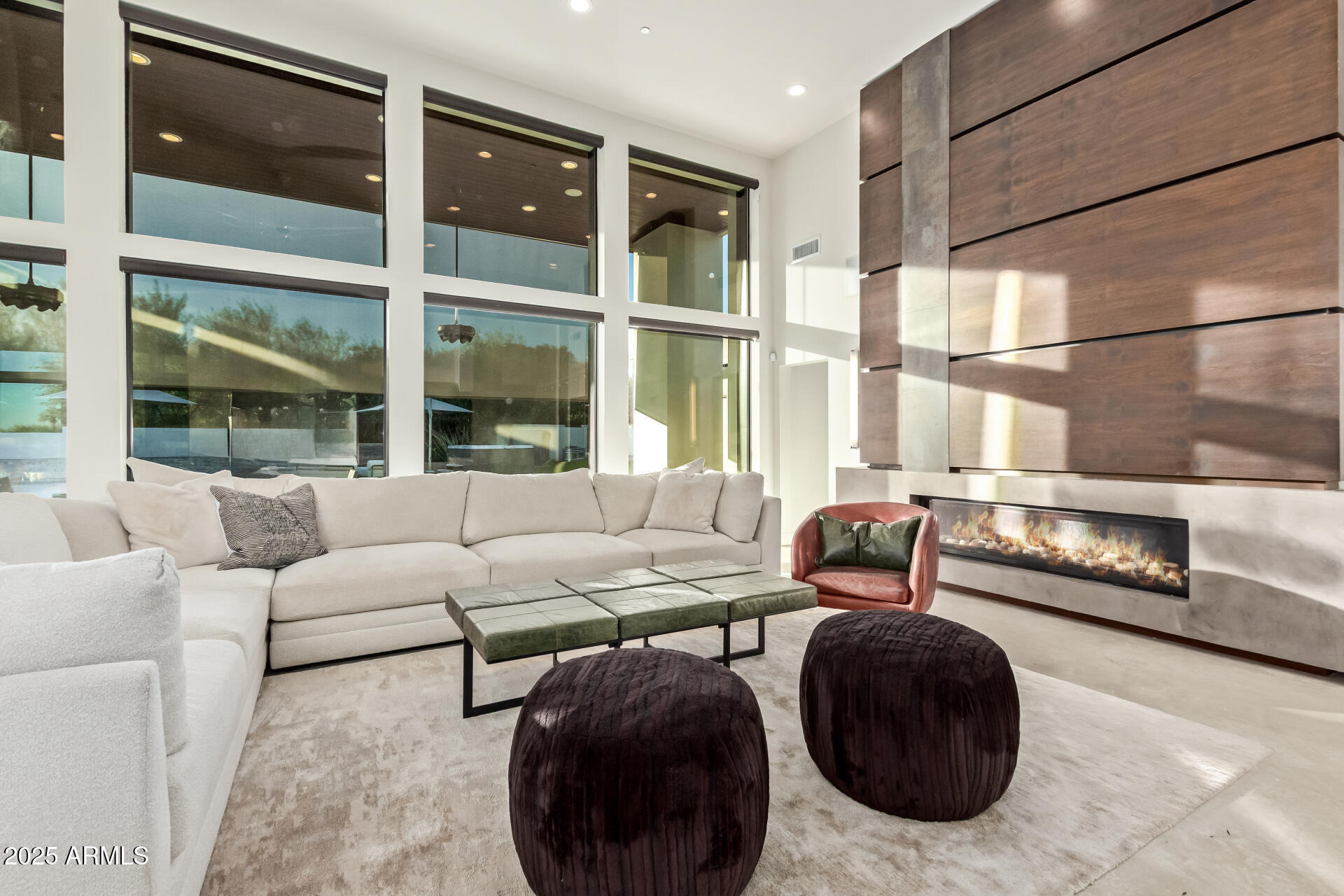 6636 North 48th Street Paradise Valley, AZ 85253 - Photo 12 of 54 a living room with furniture and a large window