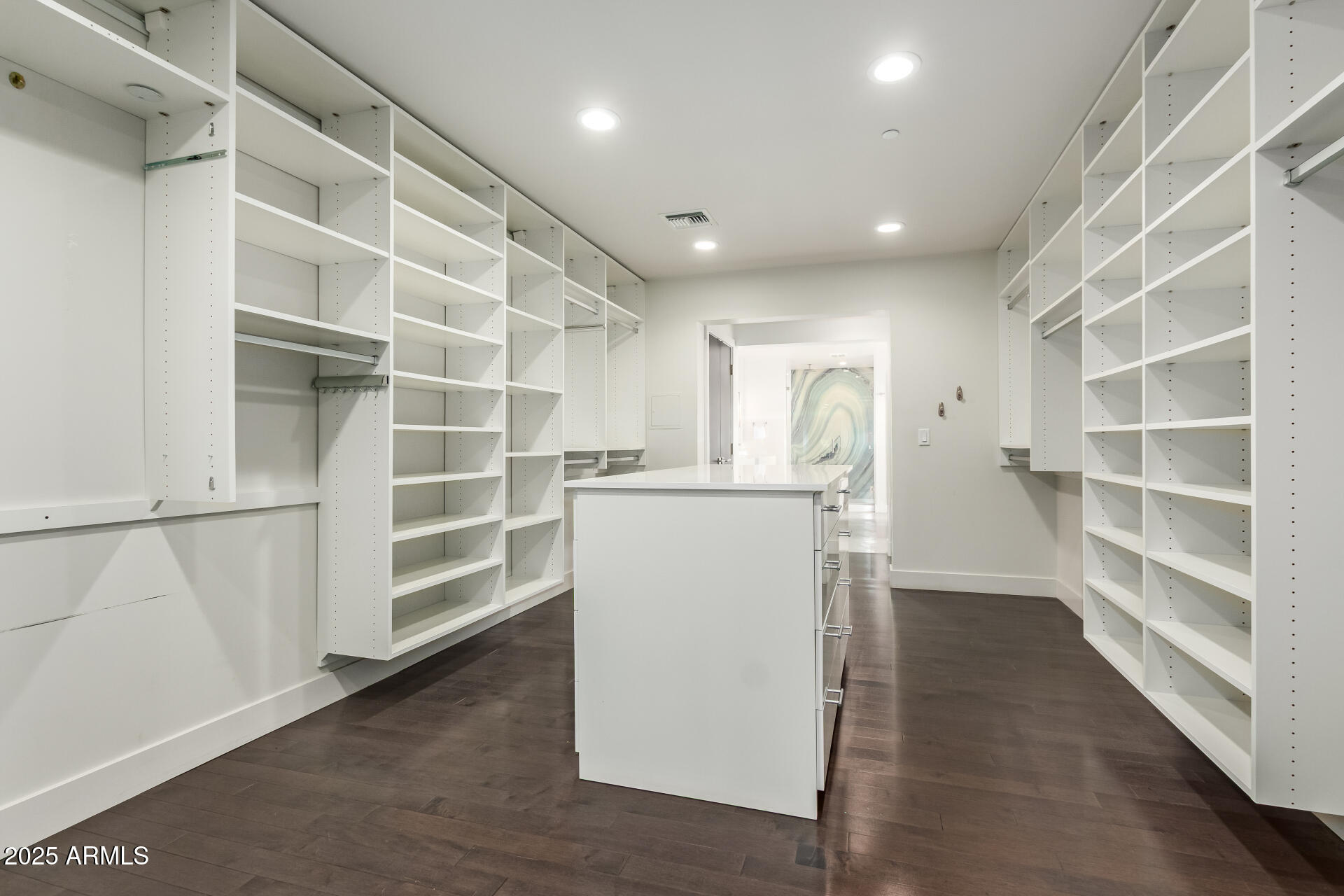 6636 North 48th Street Paradise Valley, AZ 85253 - Photo 26 of 54 a view of walk in closet with empty racks