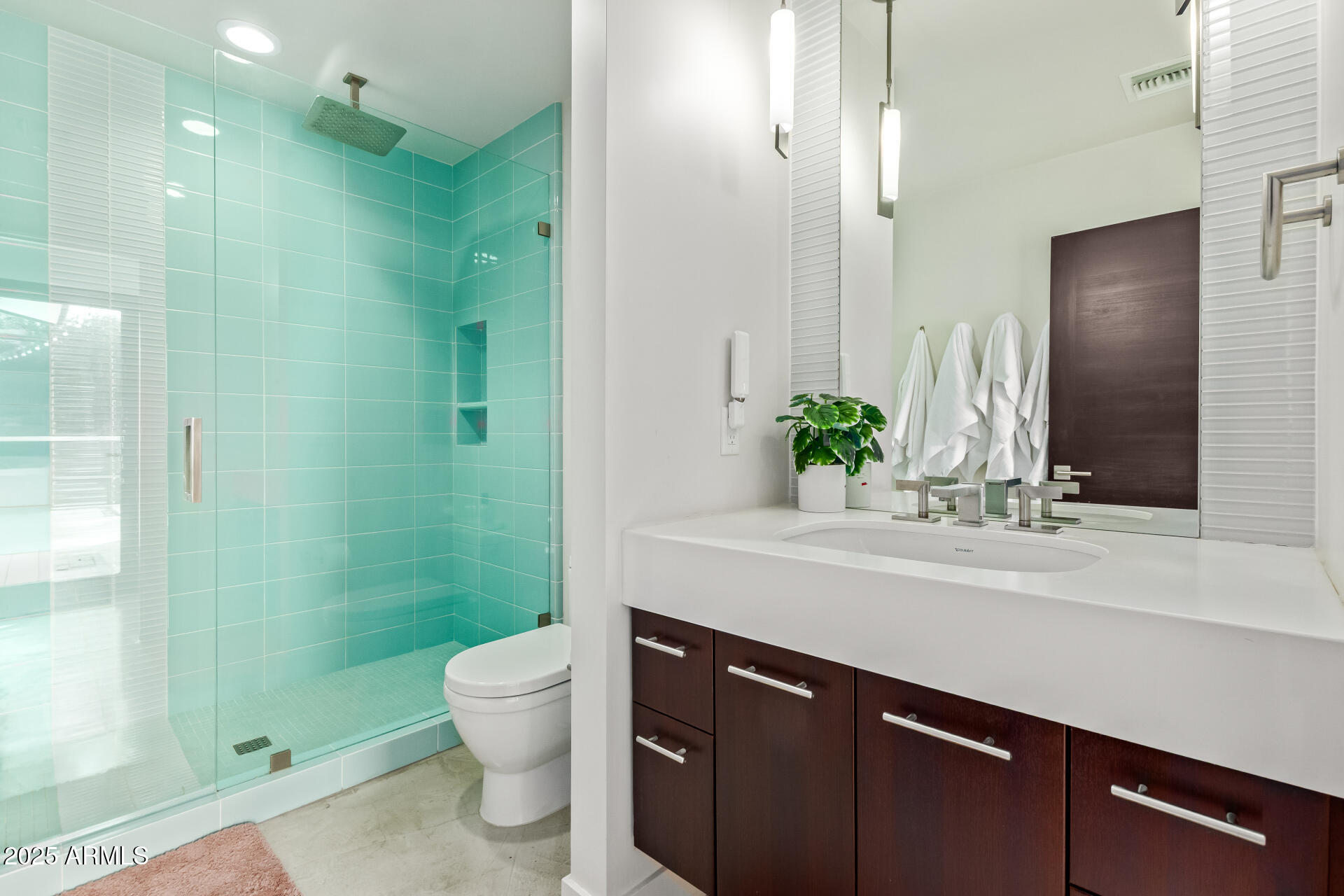 6636 North 48th Street Paradise Valley, AZ 85253 - Photo 33 of 54 a bathroom with a sink and a mirror