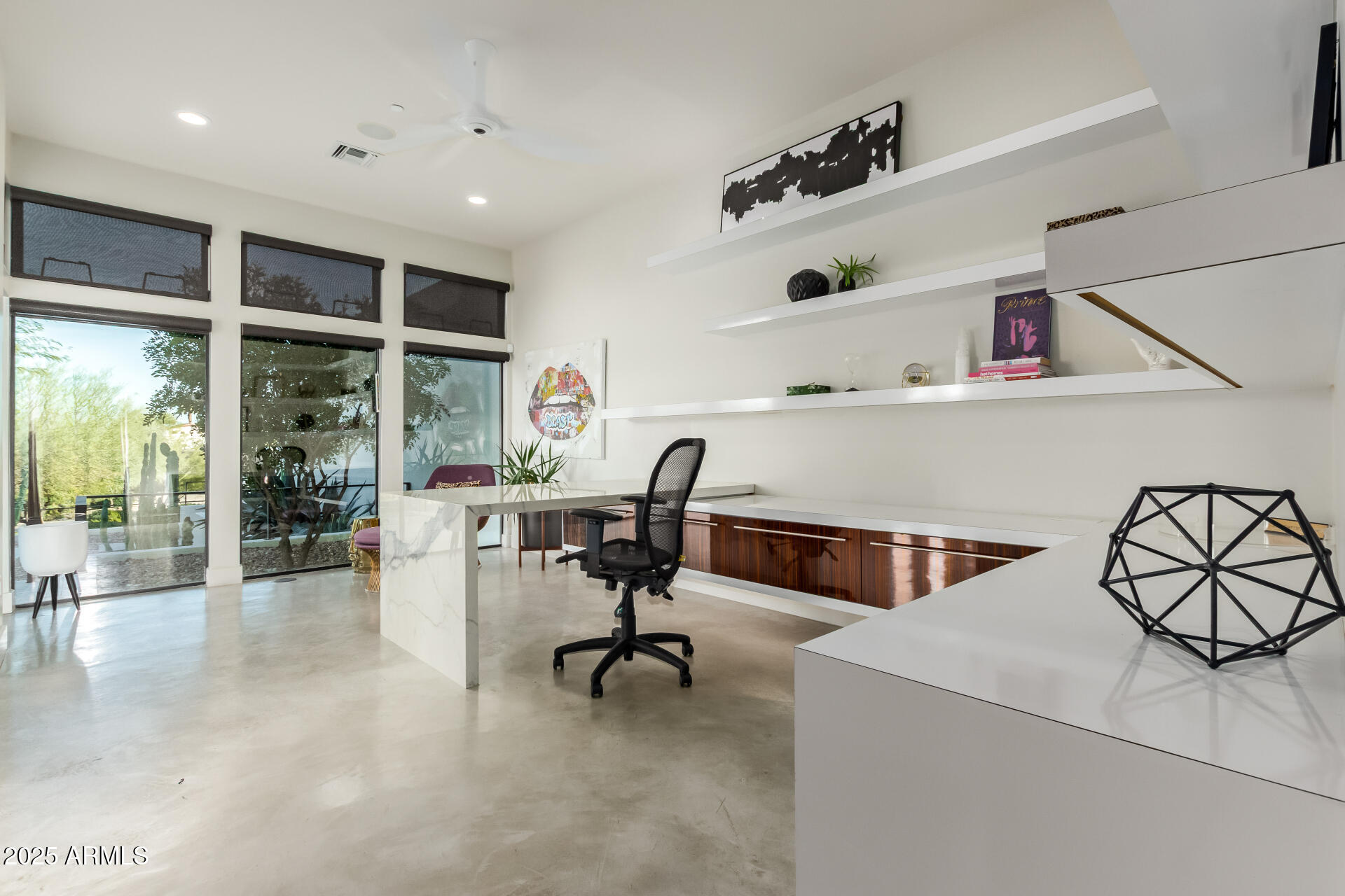 6636 North 48th Street Paradise Valley, AZ 85253 - Photo 35 of 54 a view of a workspace with furniture and a window