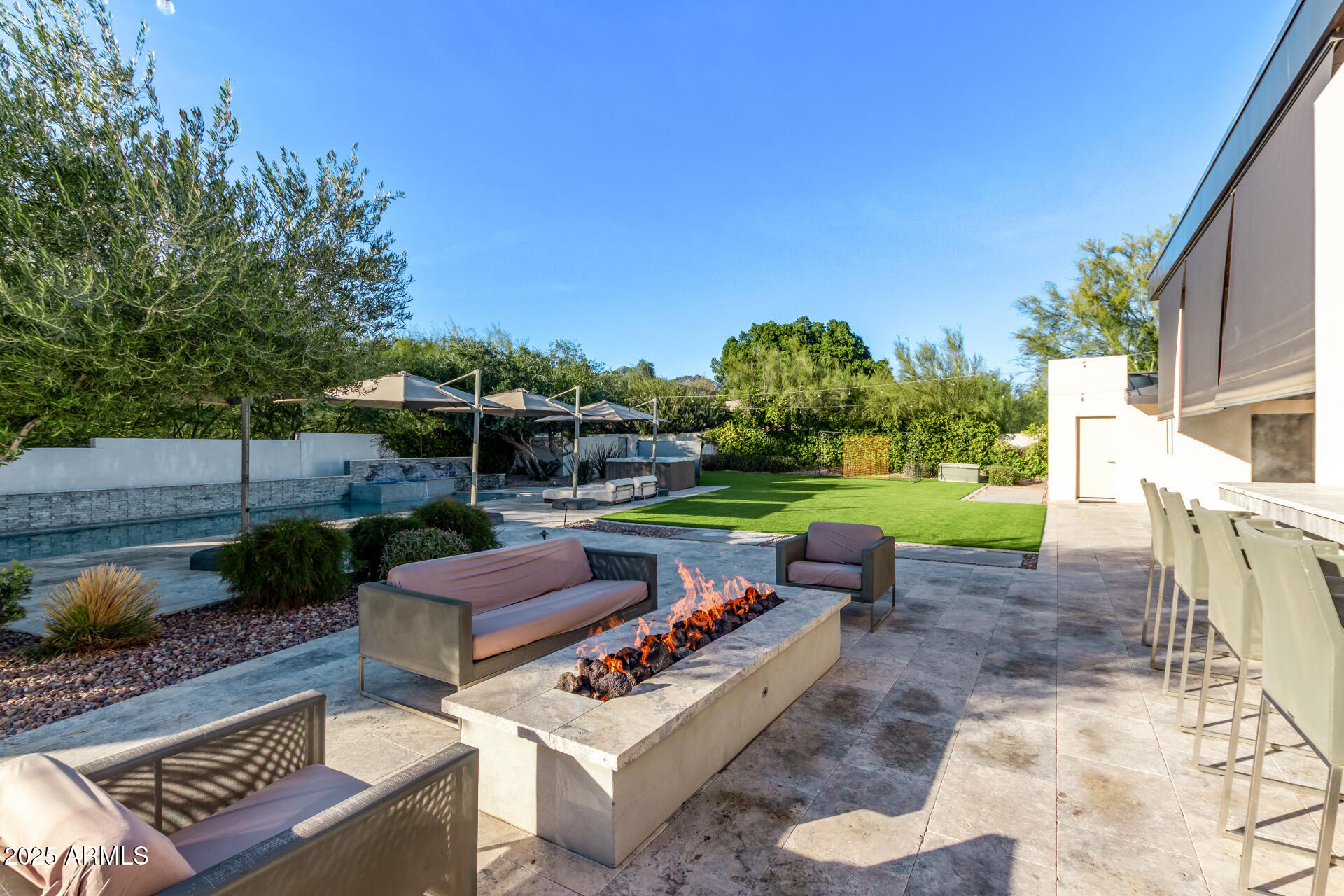 6636 North 48th Street Paradise Valley, AZ 85253 - Photo 44 of 54 a view of yard with outdoor seating and green space