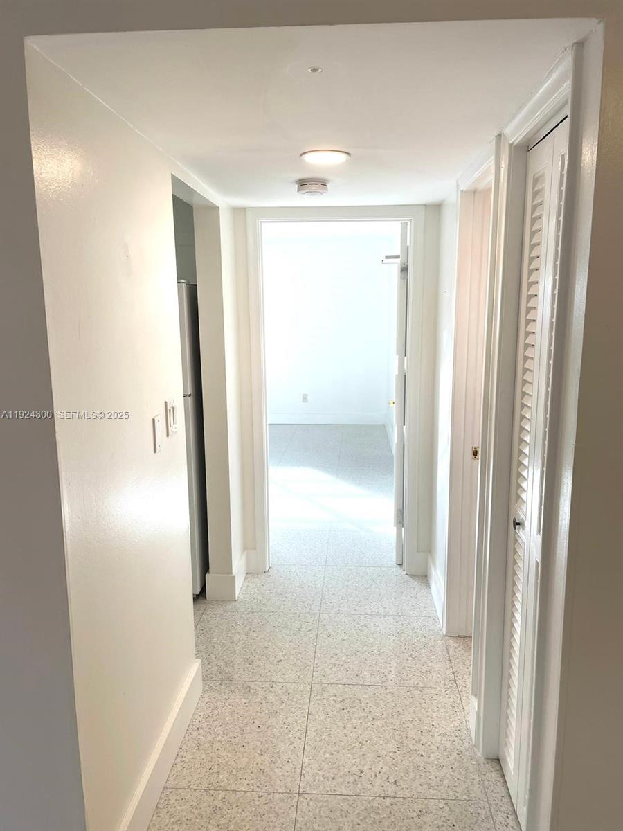 6424 Collins Avenue, Unit 204 Miami Beach, FL 33141 - Photo 13 of 21 a view of entryway with wooden floor