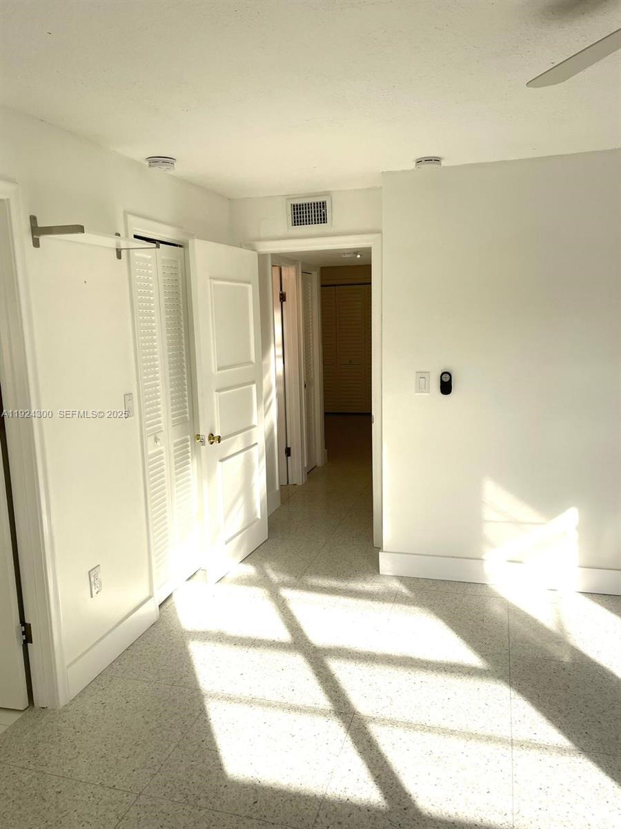 6424 Collins Avenue, Unit 204 Miami Beach, FL 33141 - Photo 15 of 21 a view of a bathroom with a tub and shower