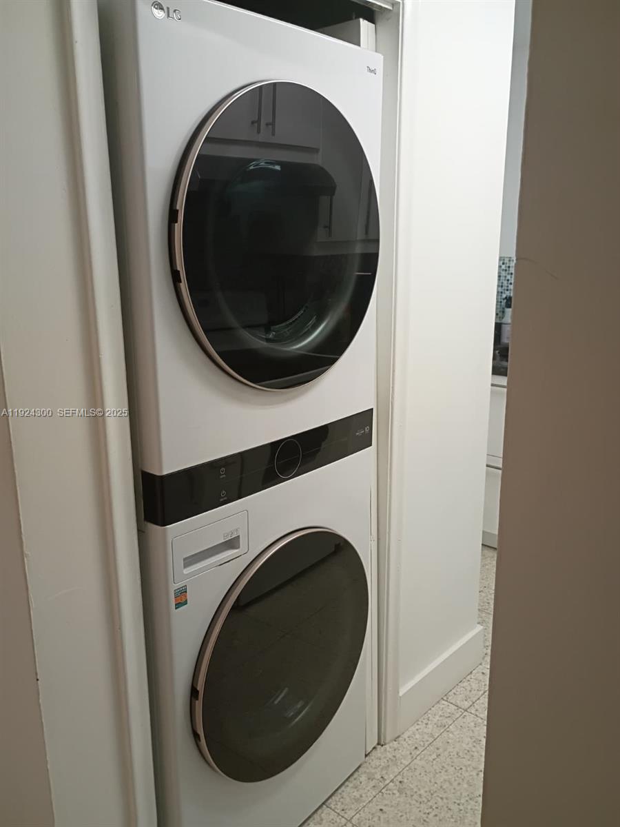 6424 Collins Avenue, Unit 204 Miami Beach, FL 33141 - Photo 19 of 21 a close up view of a washer and dryer