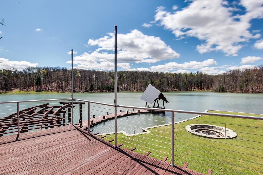 7 Long Mountain Road McMinnville, TN 37110 - Photo 14 of 62 a view of a swimming pool with a chair