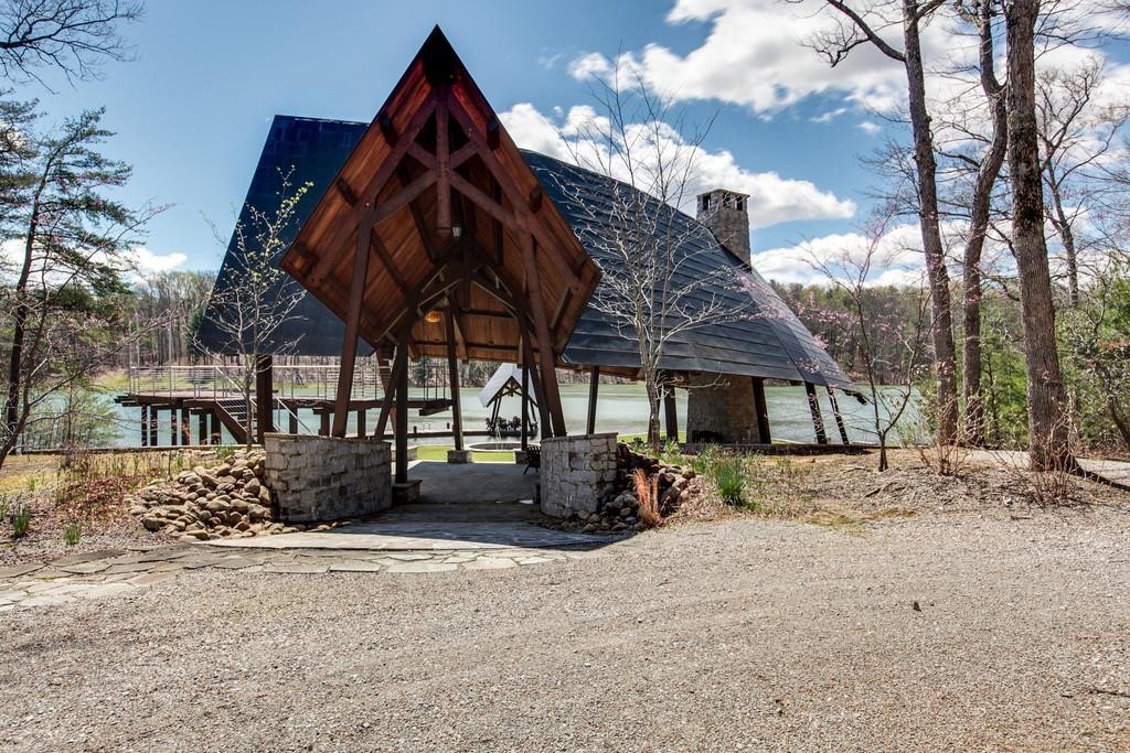 7 Long Mountain Road McMinnville, TN 37110 - Photo 15 of 62 a view of a house with backyard and trees