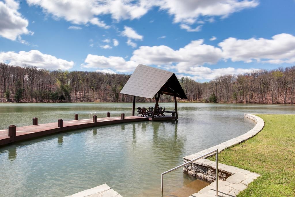 7 Long Mountain Road McMinnville, TN 37110 - Photo 2 of 62 a view of swimming pool with seating area and barbeque oven