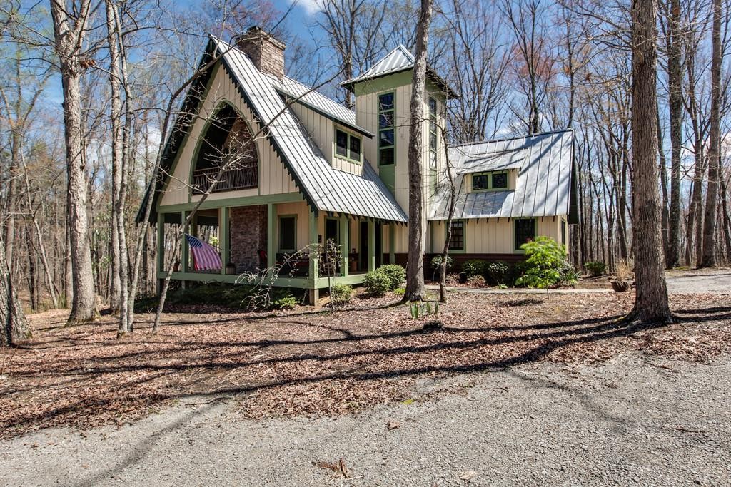 7 Long Mountain Road McMinnville, TN 37110 - Photo 29 of 62 a view of a house with a yard and sitting area