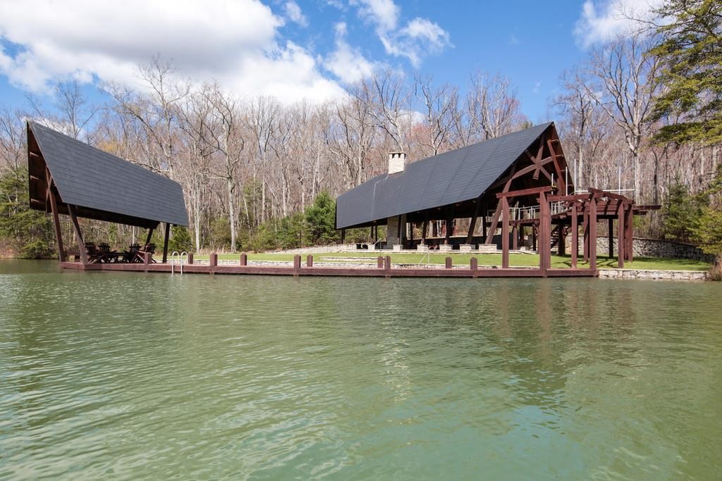 7 Long Mountain Road McMinnville, TN 37110 - Photo 30 of 62 a view of a lake with house