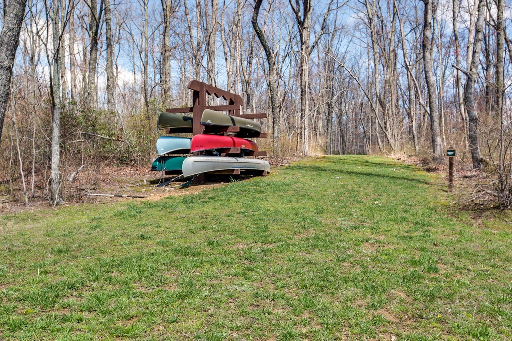 7 Long Mountain Road McMinnville, TN 37110 - Photo 46 of 62 a backyard of a house with lots of green space and fountain