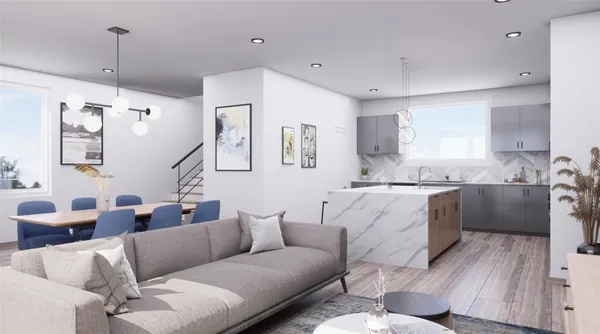a living room with furniture kitchen view and a wooden floor