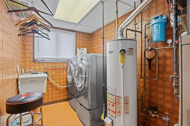 a bathroom with a toilet and shower