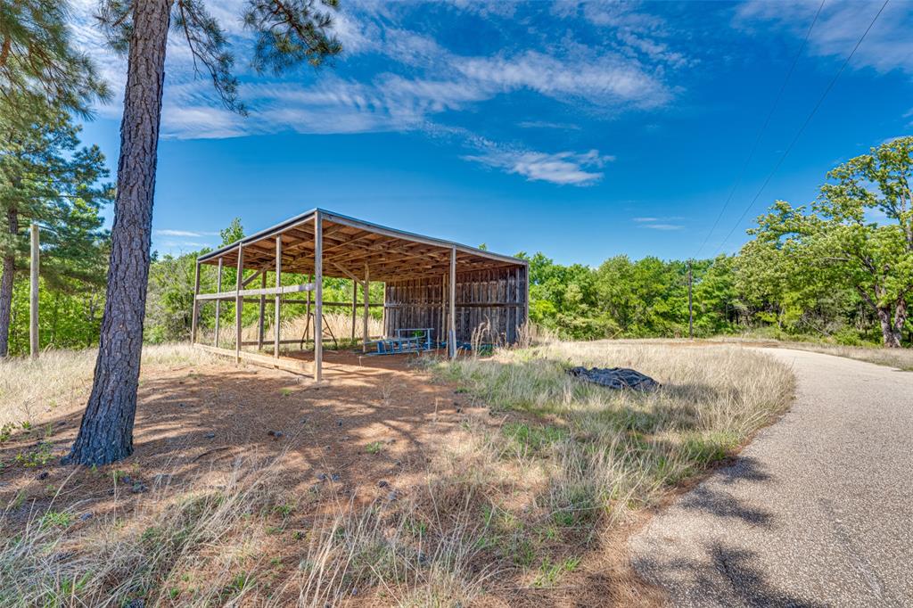 11088 County Road 334 Tyler, TX 75708 - Photo 9 of 23 a view of a house with a yard