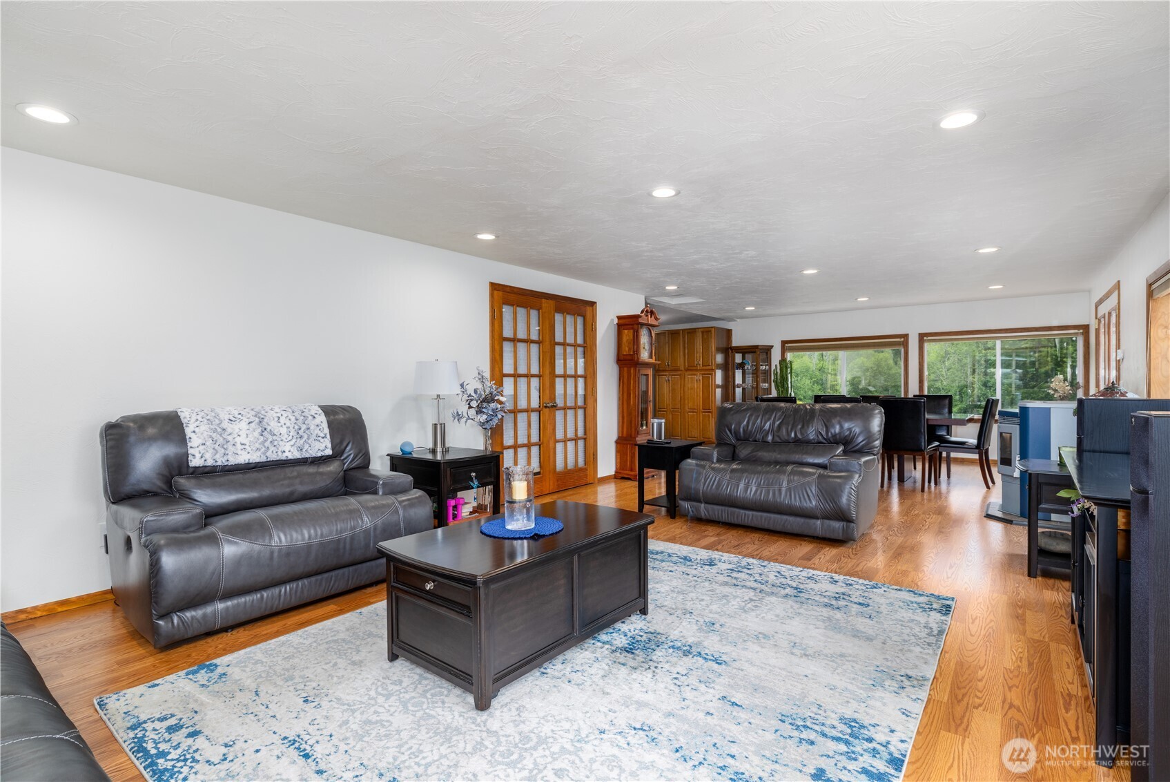 741 Southeast Cook Plant Farm Road Shelton, WA 98584 - Photo 10 of 38 a living room with furniture and wooden floor