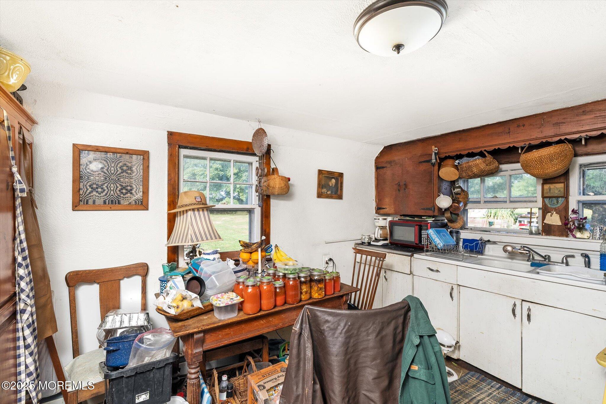 537 Chesterfield Arneytown Road Chesterfield, NJ 08515 - Photo 24 of 89 a kitchen with stainless steel appliances granite countertop a sink and cabinets