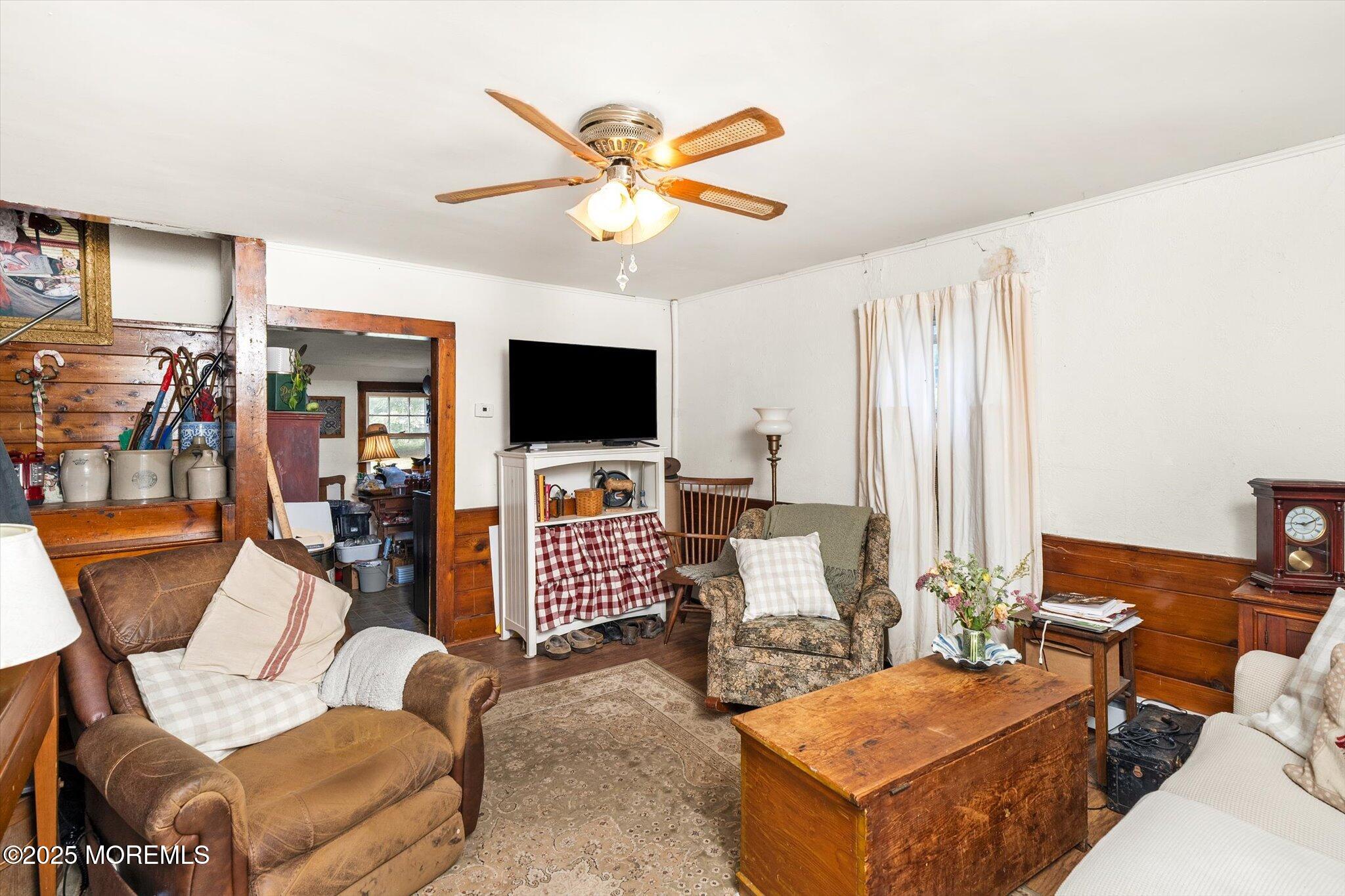 537 Chesterfield Arneytown Road Chesterfield, NJ 08515 - Photo 27 of 89 a living room with furniture and a flat screen tv