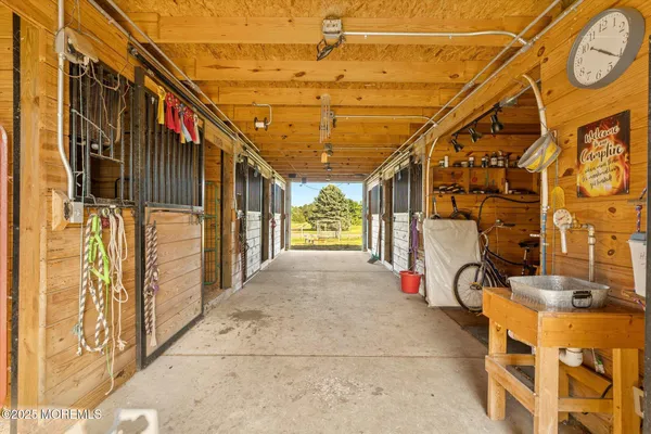 a view of an house with swimming pool and porch