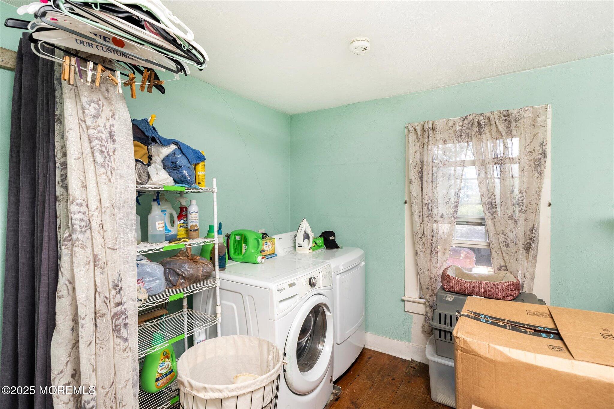 537 Chesterfield Arneytown Road Chesterfield, NJ 08515 - Photo 47 of 89 a utility room with dryer washer and a view of living room