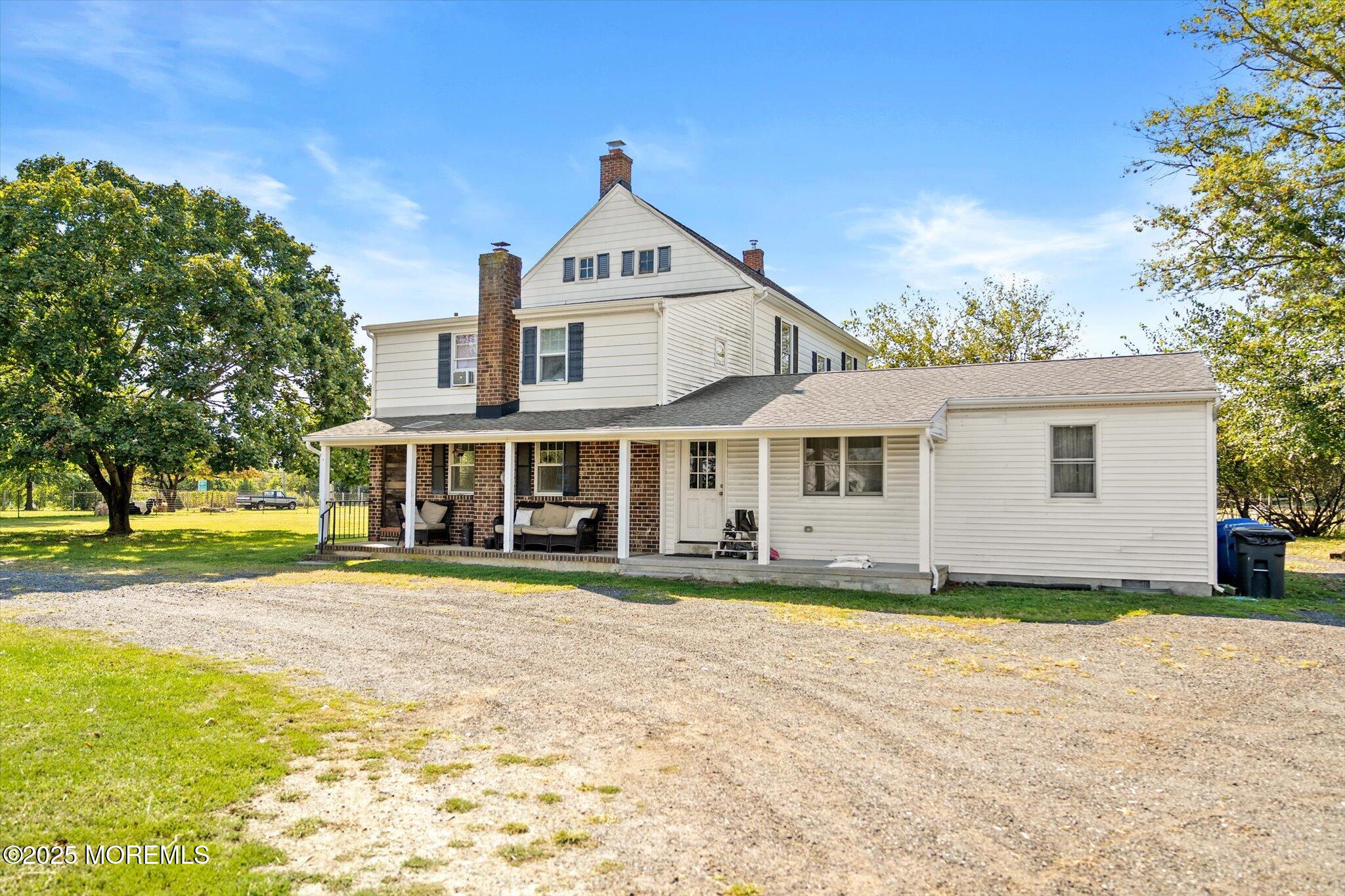 537 Chesterfield Arneytown Road Chesterfield, NJ 08515 - Photo 69 of 89 a front view of a house with a yard