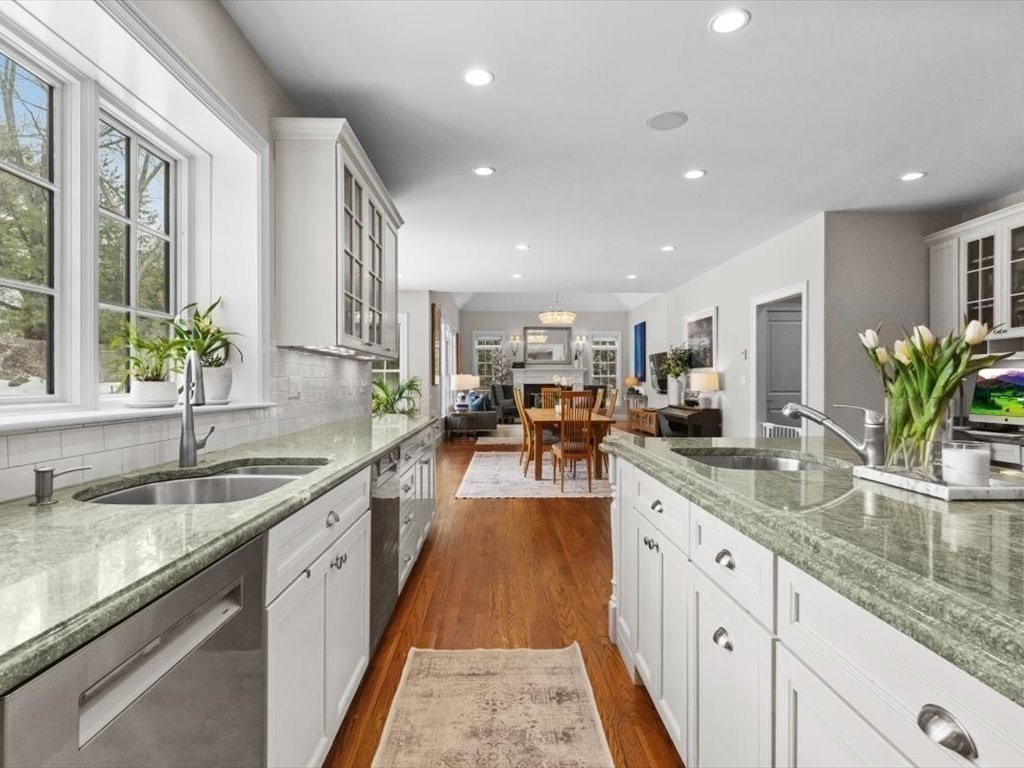 81 Fuller Street Newton, MA 02465 - Photo 12 of 42 a large kitchen with granite countertop a sink and cabinets