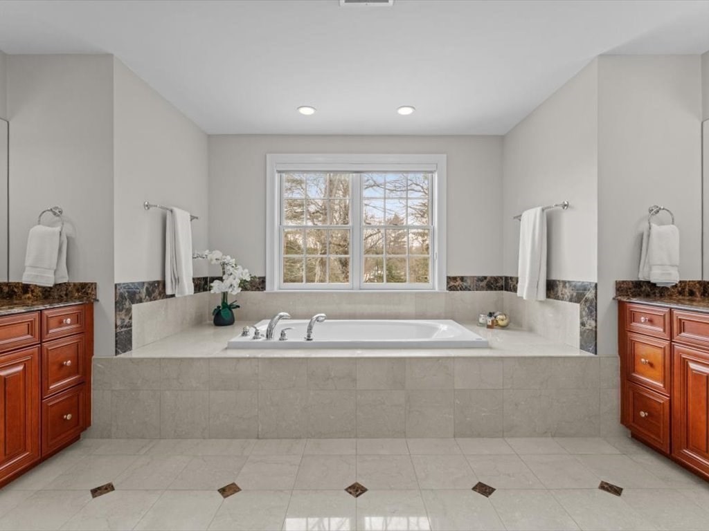 81 Fuller Street Newton, MA 02465 - Photo 23 of 42 a spacious bathroom with a bathtub a sink and a shower