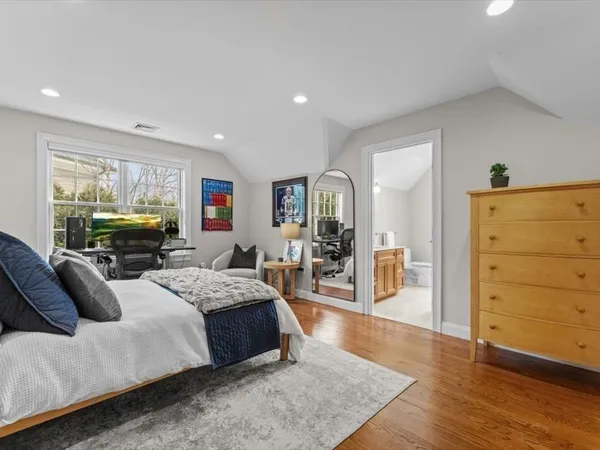 a bed room with a bed and a couch