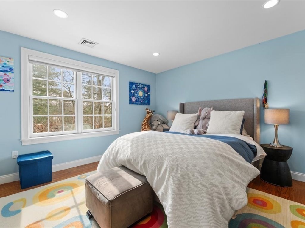 81 Fuller Street Newton, MA 02465 - Photo 26 of 42 a bed room with a bed and a couch