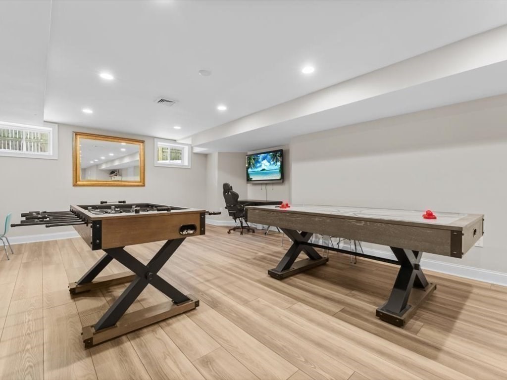 81 Fuller Street Newton, MA 02465 - Photo 35 of 42 a living room with a flat screen tv and rug floor