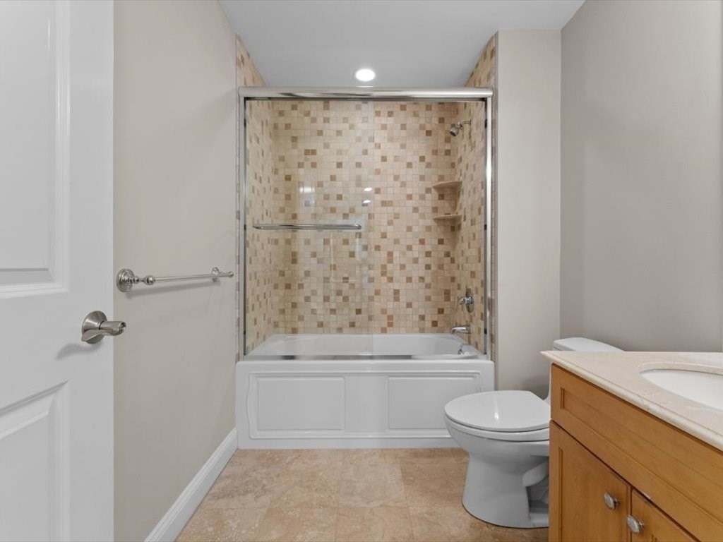 81 Fuller Street Newton, MA 02465 - Photo 37 of 42 a bathroom with a toilet and a bathtub