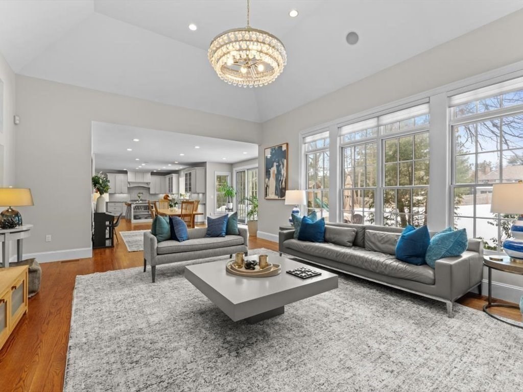 81 Fuller Street Newton, MA 02465 - Photo 6 of 42 a living room with furniture chandelier and a large window