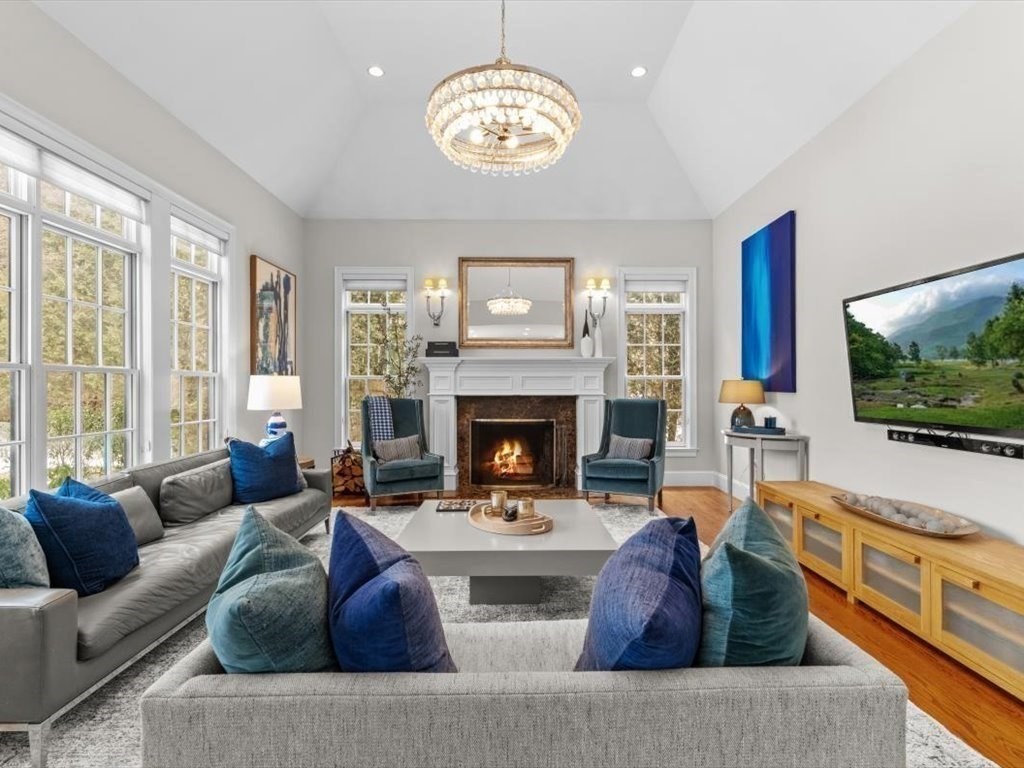 81 Fuller Street Newton, MA 02465 - Photo 7 of 42 a living room with furniture a large window and a flat screen tv