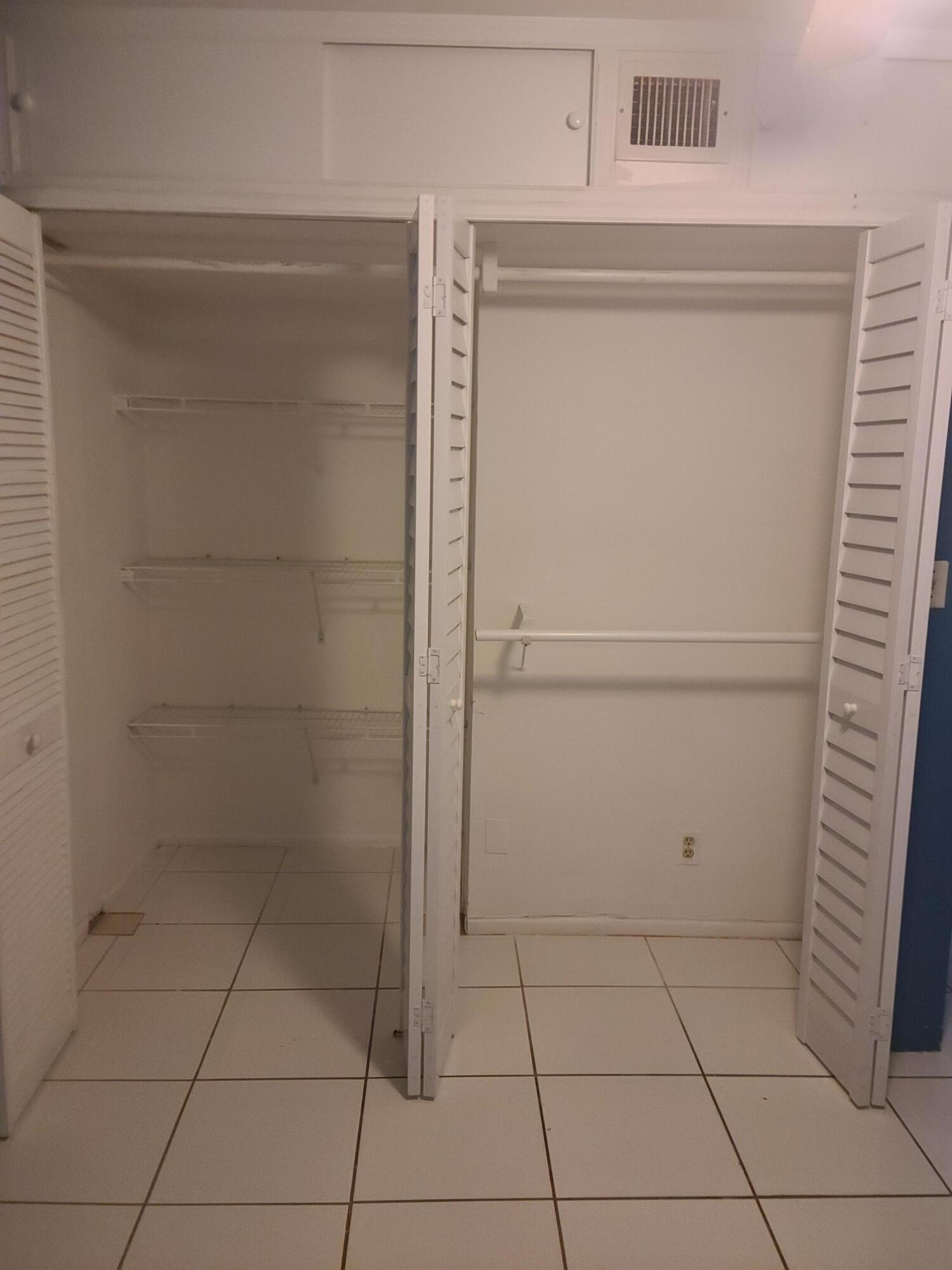 2977 Riverside Drive, Unit 202 Coral Springs, FL 33065 - Photo 8 of 12 Closet Room 2