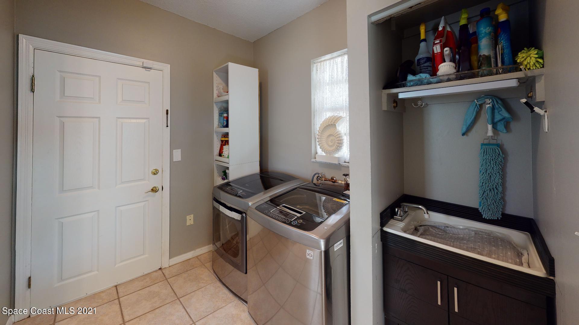 61 Country Club Road Cocoa Beach, FL 32931 - Photo 72 of 100 61-Country-Club-Rd-Laundry
