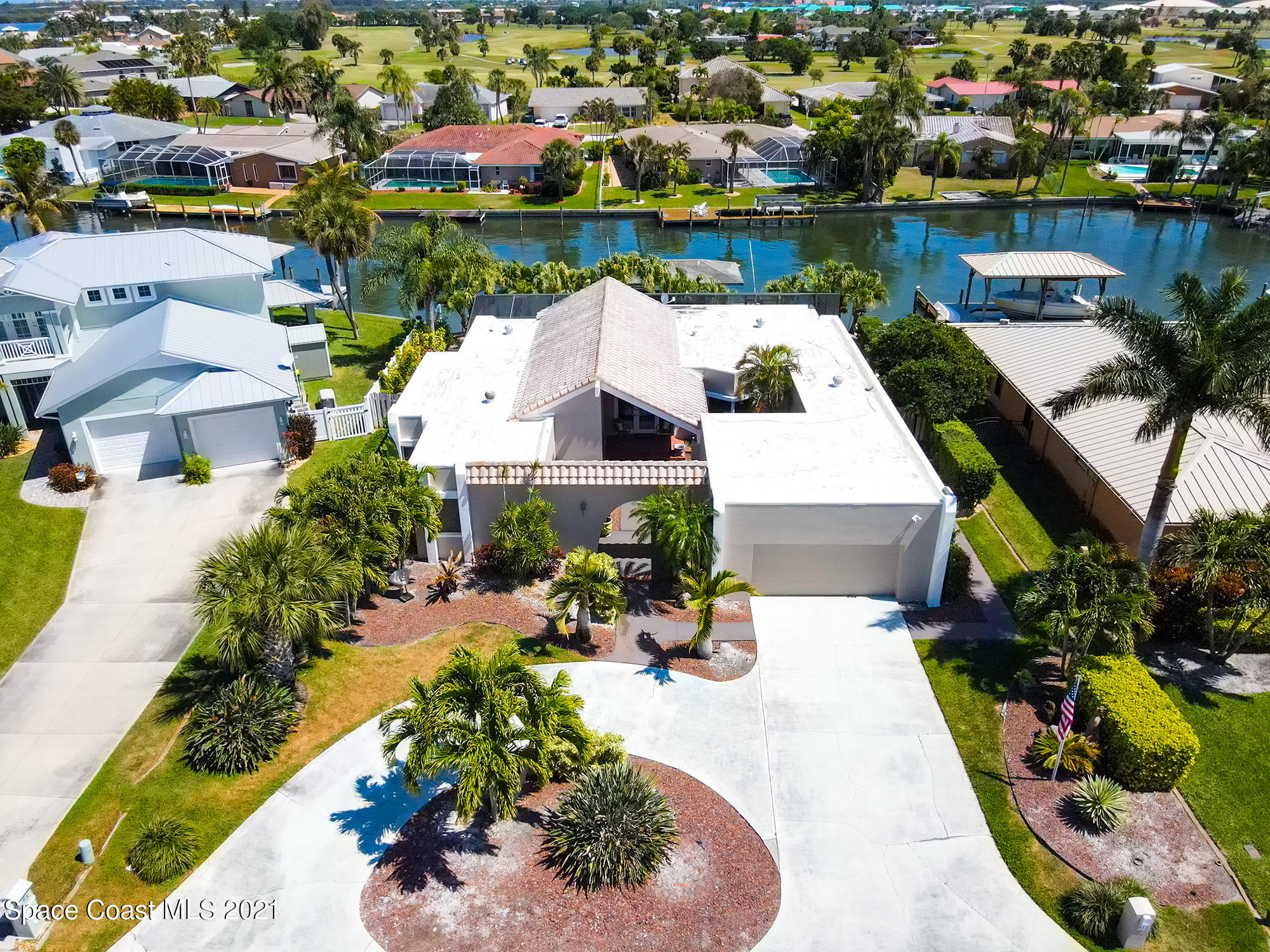 61 Country Club Road Cocoa Beach, FL 32931 - Photo 88 of 100 an aerial view of a house with outdoor space