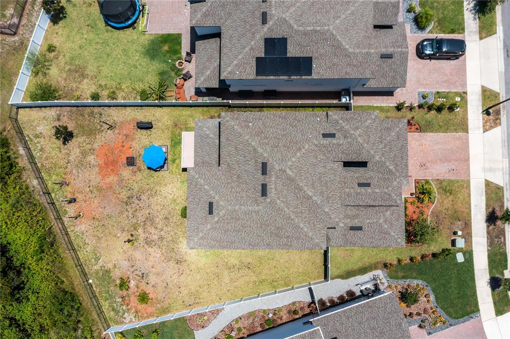 5637 Beggs Road St. Cloud, FL 34771 - Photo 34 of 35 an aerial view of a house with a yard