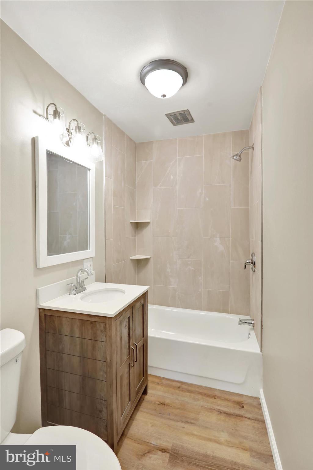 2560 Grant Street Reading, PA 19606 - Photo 17 of 30 a bathroom with a sink and a mirror