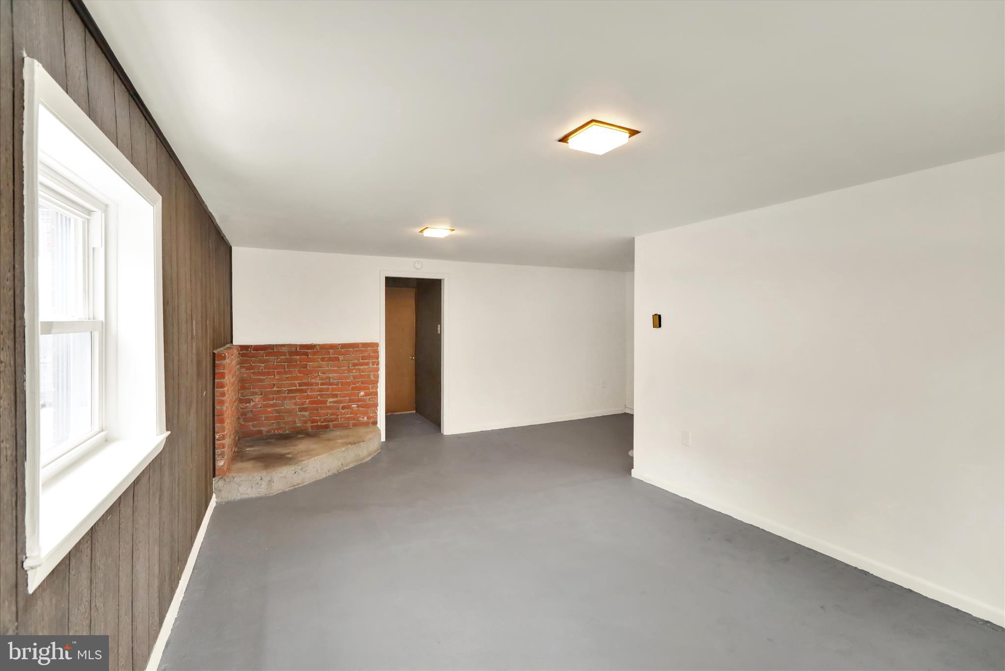 2560 Grant Street Reading, PA 19606 - Photo 24 of 30 a view of an empty room with a window