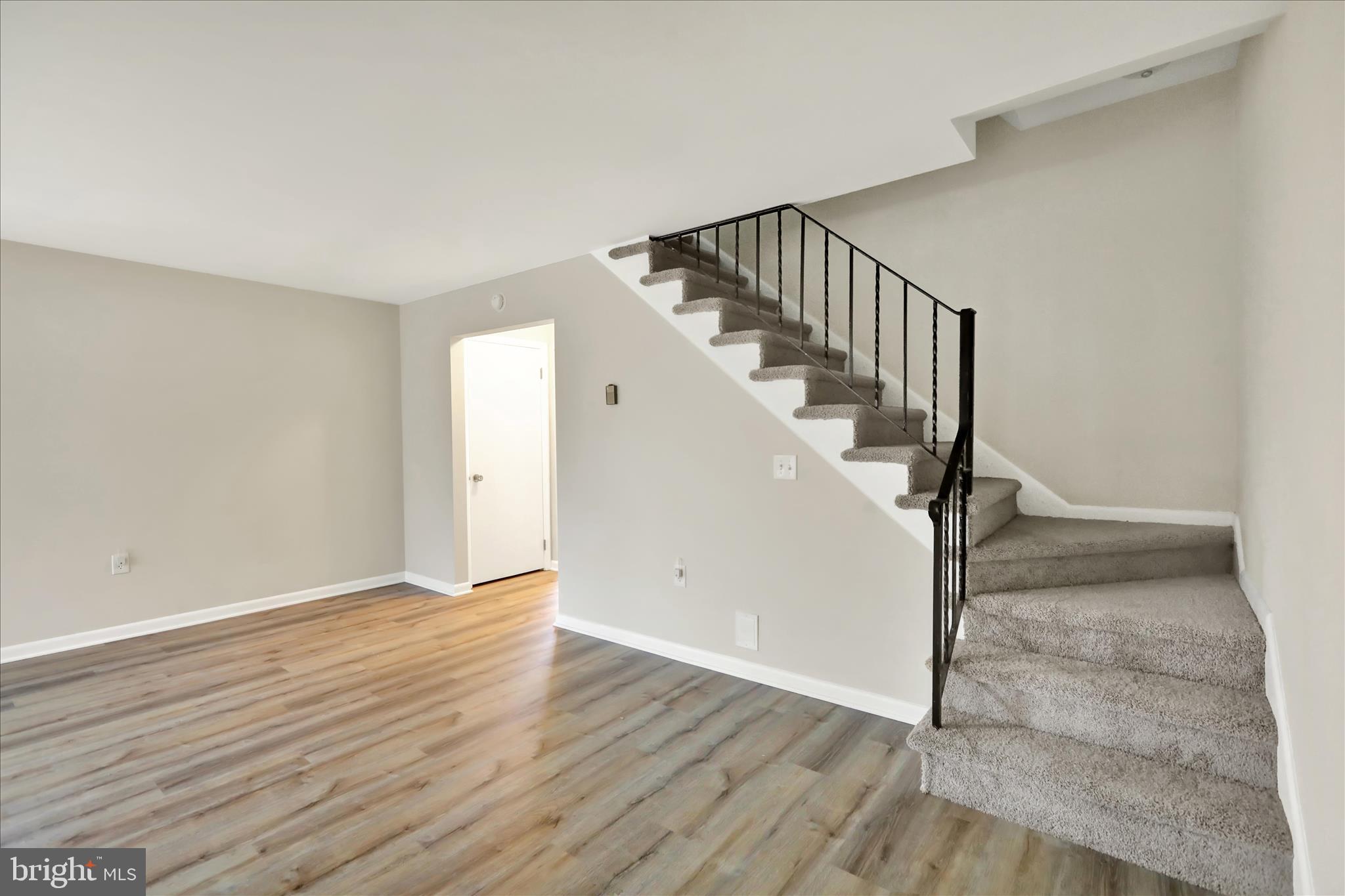 2560 Grant Street Reading, PA 19606 - Photo 7 of 30 a view of a room with wooden floor and white walls