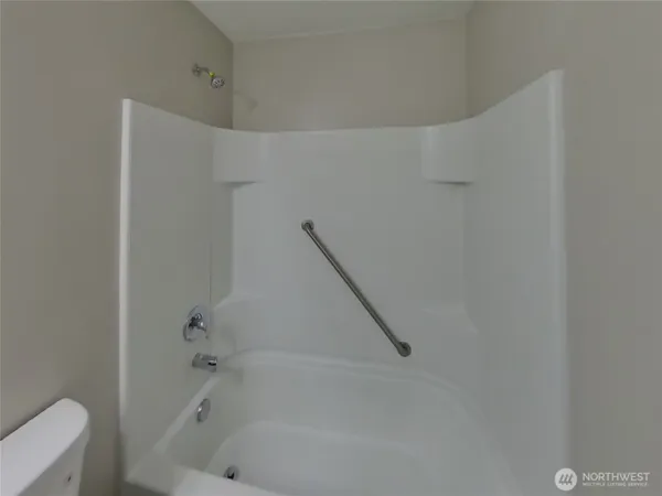 a bathroom with a bathtub