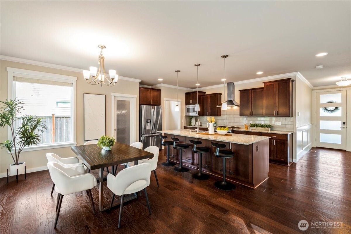 11 200th Place Southwest Bothell, WA 98012 - Photo 15 of 40 a large kitchen with a table and chairs