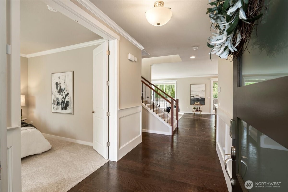 11 200th Place Southwest Bothell, WA 98012 - Photo 2 of 40 a view of entryway and hall with wooden floor