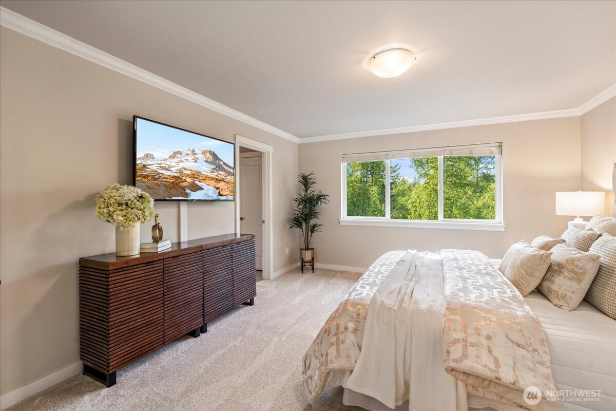 11 200th Place Southwest Bothell, WA 98012 - Photo 25 of 40 a bedroom with a bed and a dresser