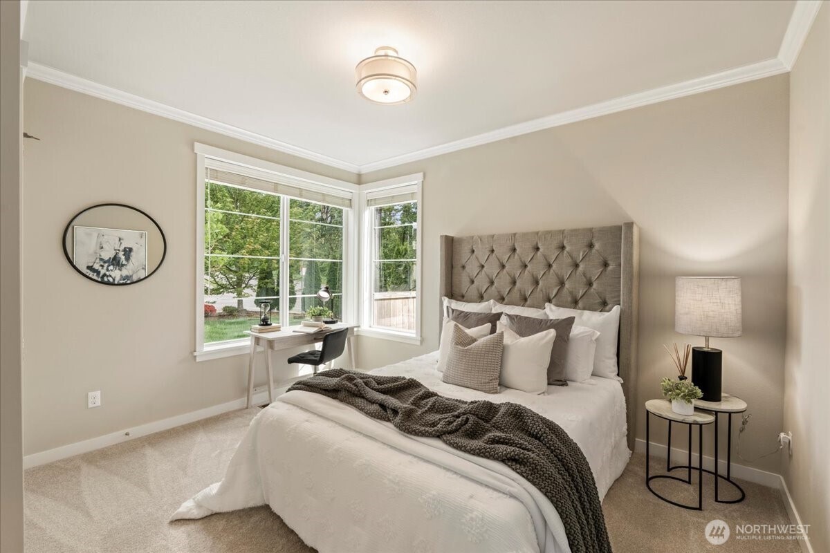 11 200th Place Southwest Bothell, WA 98012 - Photo 3 of 40 a bedroom with bed and a large window
