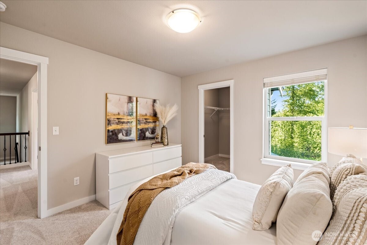 11 200th Place Southwest Bothell, WA 98012 - Photo 31 of 40 a bedroom with a bed and a window