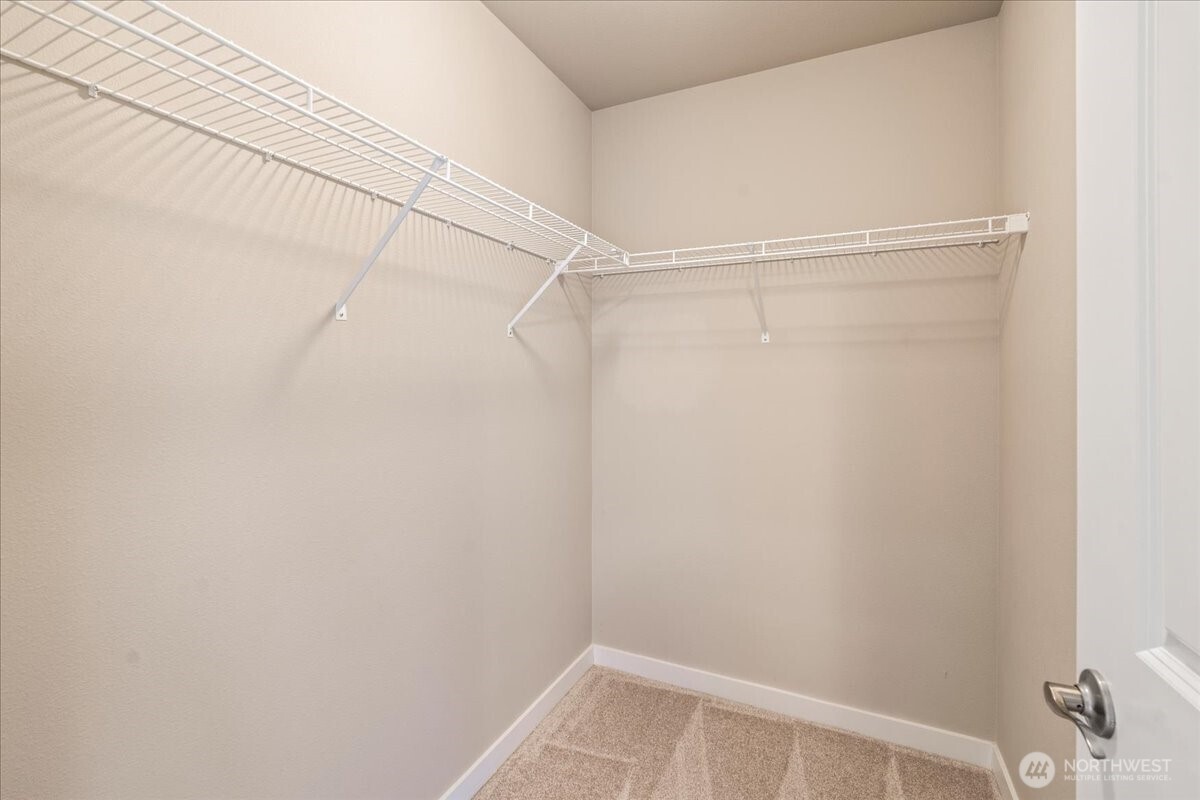 11 200th Place Southwest Bothell, WA 98012 - Photo 32 of 40 a view of a room with racks on the wall