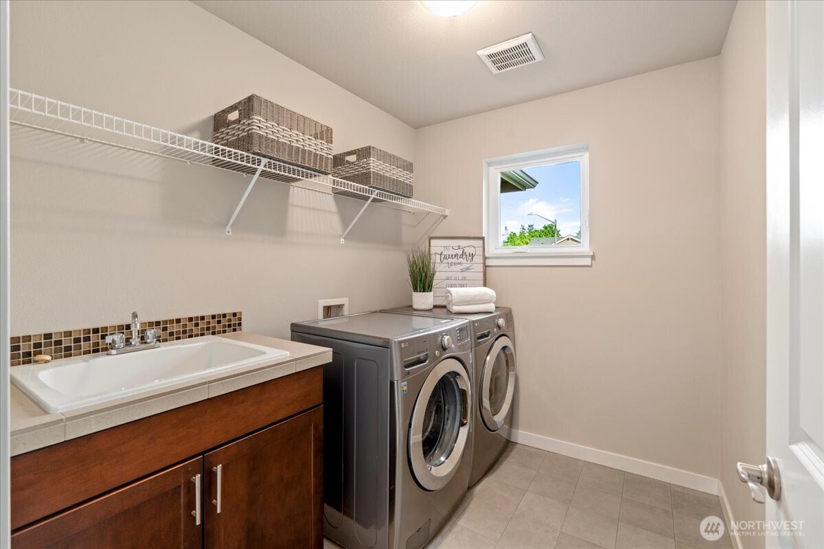 11 200th Place Southwest Bothell, WA 98012 - Photo 36 of 40 a utility room with dryer and washer
