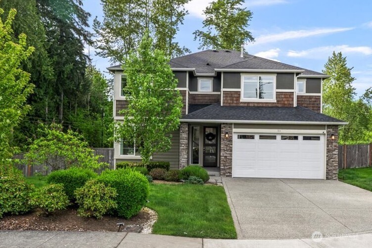 11 200th Place Southwest Bothell, WA 98012 - Photo 40 of 40 a front view of a house with a garden