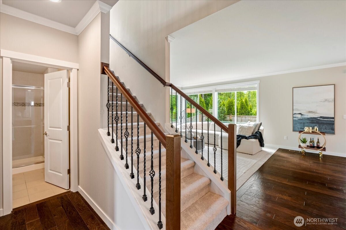 11 200th Place Southwest Bothell, WA 98012 - Photo 5 of 40 a view of an entryway with wooden floor and windows
